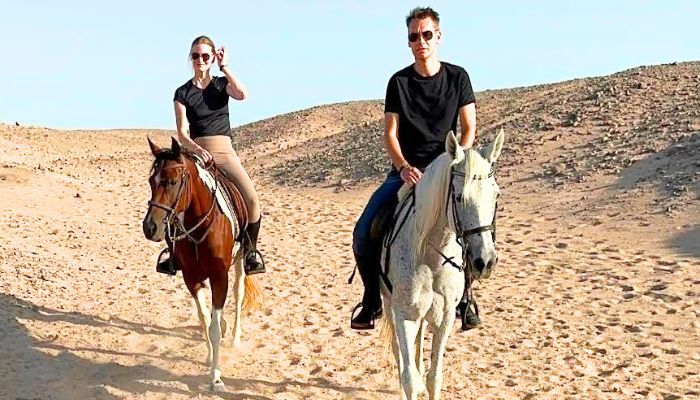 Desert ride and swimming with horses