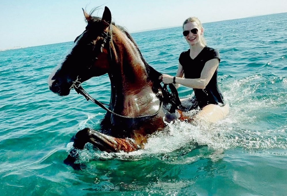 Swimming with horses in the Red Sea